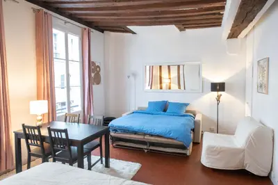 Un ou plusieurs lits dans un hébergement de l'établissement Fantastic apartment in Paris