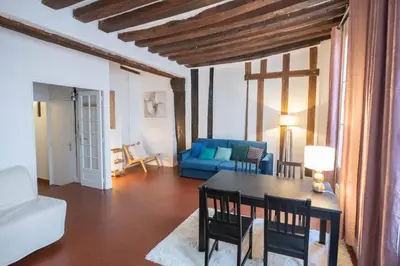 Coin salon dans l'établissement Fantastic apartment in Paris