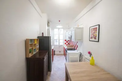 Un ou plusieurs lits dans un hébergement de l'établissement Superbe appartement Notre-Dame