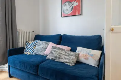 Coin salon dans l'établissement Superbe appartement Notre-Dame
