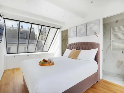 Un ou plusieurs lits dans un hébergement de l'établissement Exceptional triplex with terrace - Montmartre