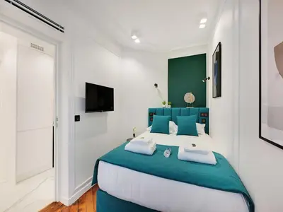 Un ou plusieurs lits dans un hébergement de l'établissement Amazing Apartment - 2BR 6P - Gare Saint-Lazare