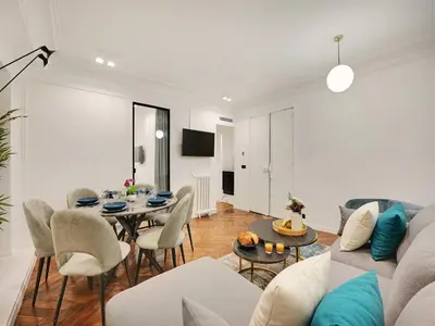 Coin salon dans l'établissement Amazing Apartment - 2BR 6P - Gare Saint-Lazare
