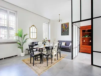 Coin salon dans l'établissement Magnificent apartment - 2BR 7P - Les Buttes Chaumont