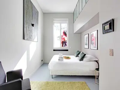Un ou plusieurs lits dans un hébergement de l'établissement Magnificent apartment - 2BR 7P - Les Buttes Chaumont