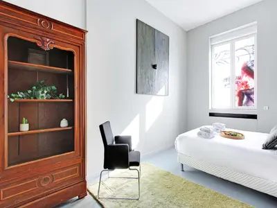 Un ou plusieurs lits dans un hébergement de l'établissement Magnificent apartment - 2BR 7P - Les Buttes Chaumont