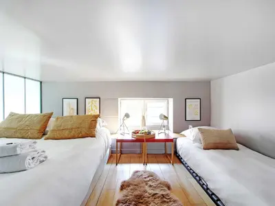 Un ou plusieurs lits dans un hébergement de l'établissement Magnificent apartment - 2BR 7P - Les Buttes Chaumont