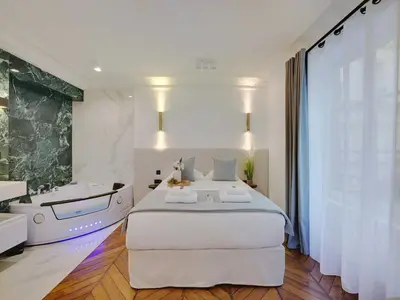 Un ou plusieurs lits dans un hébergement de l'établissement Charming apartment - 2BR 6P - Gare Saint-Lazare