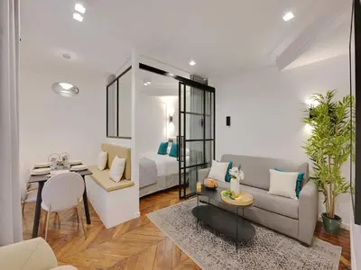 Coin salon dans l'établissement Charming apartment - 2BR 6P - Gare Saint-Lazare