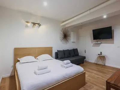 Un ou plusieurs lits dans un hébergement de l'établissement Magnificent apt - 1BD 6P - Auteuil Quai de Seine