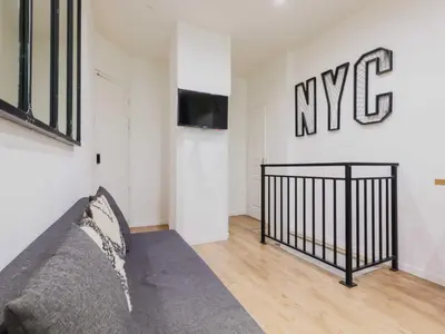 Télévision ou salle de divertissement dans l'établissement Magnificent apt - 1BD 6P - Auteuil Quai de Seine