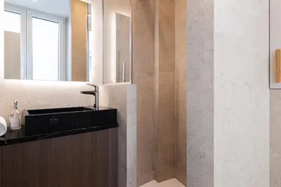 Cuisine ou kitchenette dans l'établissement La Suite - Voltaire III - LOFT with AC