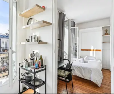 Un ou plusieurs lits dans un hébergement de l'établissement Appartement Paris 15 Lourmel