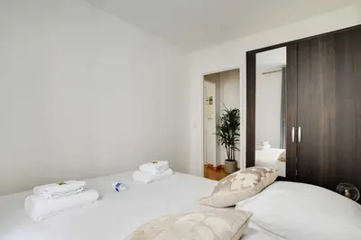 Un ou plusieurs lits dans un hébergement de l'établissement Cosy apartment - 1BR-4P - Place de la Nation