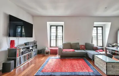 Coin salon dans l'établissement Appartement Chic et central