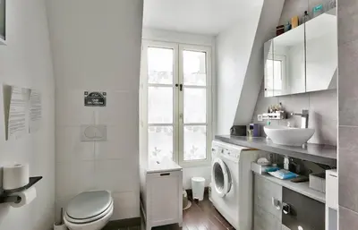 Cuisine ou kitchenette dans l'établissement Appartement Chic et central