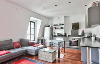 Cuisine ou kitchenette dans l'établissement Appartement Chic et central