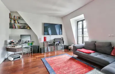 Télévision ou salle de divertissement dans l'établissement Appartement Chic et central