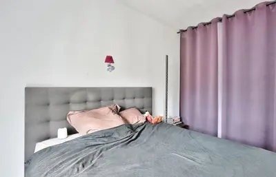 Un ou plusieurs lits dans un hébergement de l'établissement Appartement Chic et central