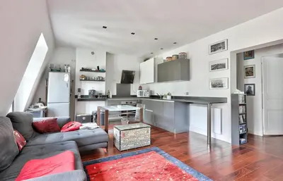 Cuisine ou kitchenette dans l'établissement Appartement Chic et central