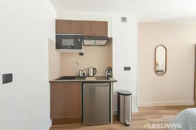 Cuisine ou kitchenette dans l'établissement Charming 16m Studio in Paris 20 with shared terrace