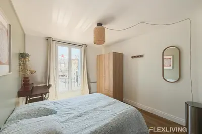 Un ou plusieurs lits dans un hébergement de l'établissement Charming 16m Studio in Paris 20 with shared terrace
