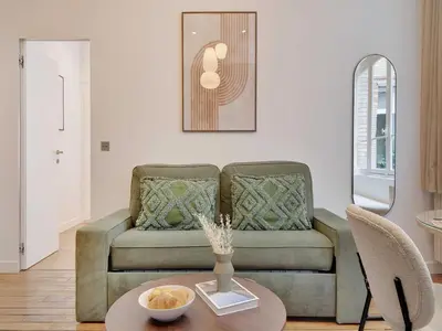 Coin salon dans l'établissement Chic apartment - 1BR 4P - République