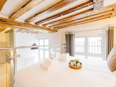 Un ou plusieurs lits dans un hébergement de l'établissement Quiet apartment 1BR 4P - Place des Victoires