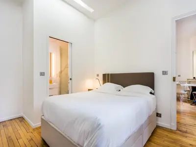 Un ou plusieurs lits dans un hébergement de l'établissement Cozy apartment - 1BR 4P - Trocadéro Eiffel Tower