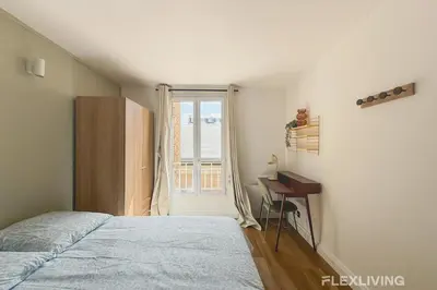 Un ou plusieurs lits dans un hébergement de l'établissement Charming 16m Studio in Paris 20 with shared terrace