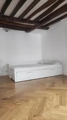 Un ou plusieurs lits dans un hébergement de l'établissement Elegant Haussmann apartment 50m G Lafayette