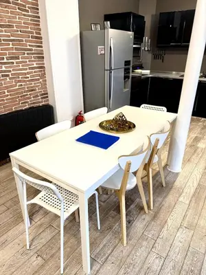 Cuisine ou kitchenette dans l'établissement Le Grand Jaures 8P Paris Gestion Immo Daumesnil