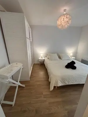 Un ou plusieurs lits dans un hébergement de l'établissement Appartement Odéon Paris