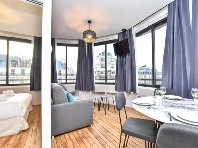 Coin salon dans l'établissement Bright apartment - 1BR 4P - near Opéra Garnier