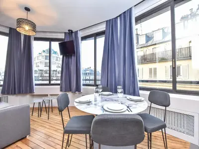 Coin salon dans l'établissement Bright apartment - 1BR 4P - near Opéra Garnier
