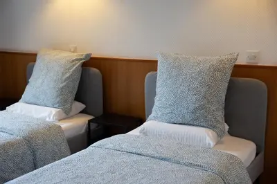 Un ou plusieurs lits dans un hébergement de l'établissement 7mn walk to Metro, in ApartHotel