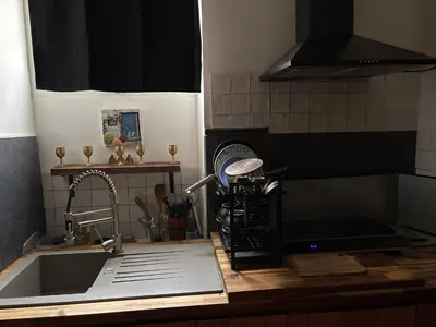 Cuisine ou kitchenette dans l'établissement Grand Studio Paris Bastille