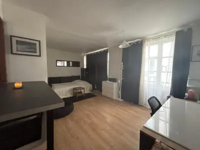 Coin salon dans l'établissement Grand Studio Paris Bastille