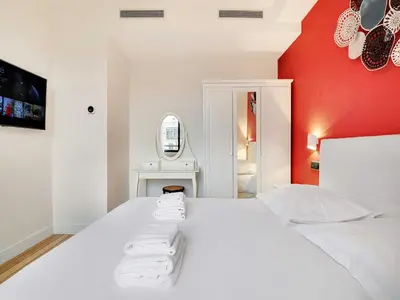Un ou plusieurs lits dans un hébergement de l'établissement Modern apartment - 2BR 8P - near Opéra Garnier