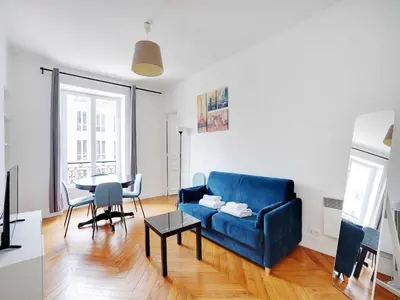 Coin salon dans l'établissement Charming Flat -2BR 6P- Montorgueil