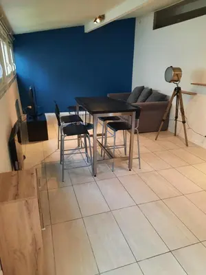 Coin salon dans l'établissement Le Cocon