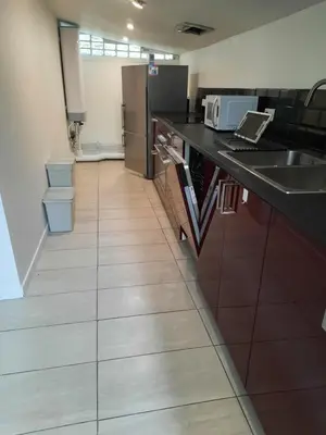 Cuisine ou kitchenette dans l'établissement Le Cocon