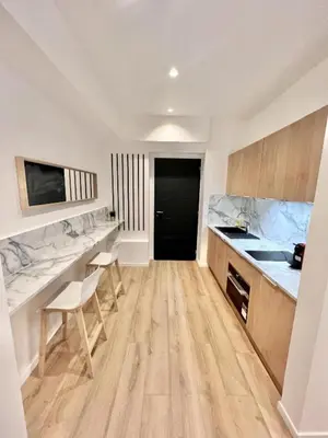 Cuisine ou kitchenette dans l'établissement Résidence 66 Grands Champs - Paris Nation
