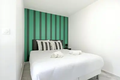 Un ou plusieurs lits dans un hébergement de l'établissement Appartement agréable Montmartre - Sacré-Cœur