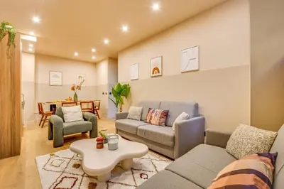 Coin salon dans l'établissement Spacious Apartment - 2BR 10P - Place d'Italie
