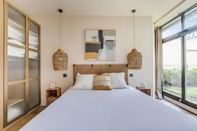 Un ou plusieurs lits dans un hébergement de l'établissement Spacious Apartment - 2BR 10P - Place d'Italie
