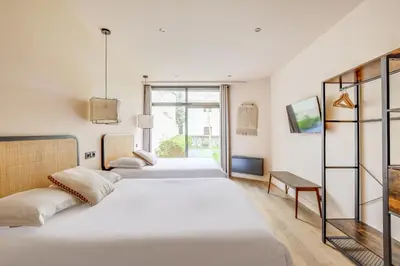 Un ou plusieurs lits dans un hébergement de l'établissement Spacious Apartment - 2BR 10P - Place d'Italie