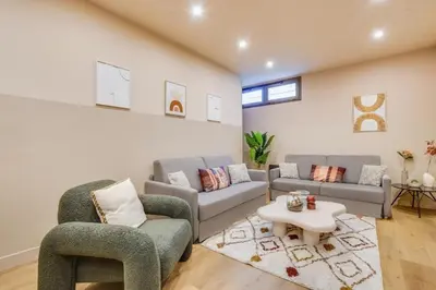 Coin salon dans l'établissement Spacious Apartment - 2BR 10P - Place d'Italie