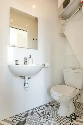 Salle de bains dans l'établissement Studio lumineux confortable Alesia Montparnasse