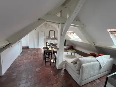 Coin salon dans l'établissement Penbed - Place Vendome - 1BR